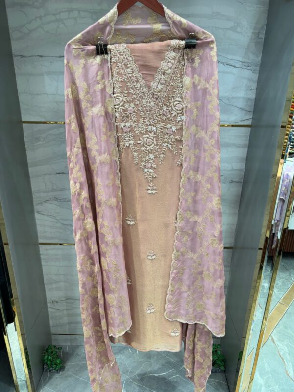 Pure Tissue Unstitched Suit with Dabka and Sequence Work.