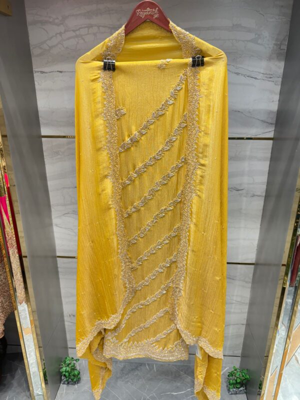 Pure crush tissue unstitched suit with elegant hand work designing
