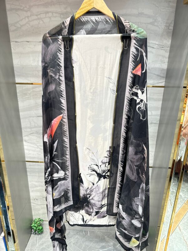 Pure Muslin Unstitched Suit with stunning floral print.
