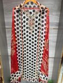 Elegant Pure Organza Polka Dot suit set with floral dupatta.