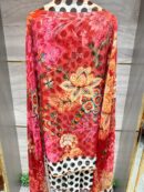 Elegant Pure Organza Polka Dot suit set with floral dupatta.