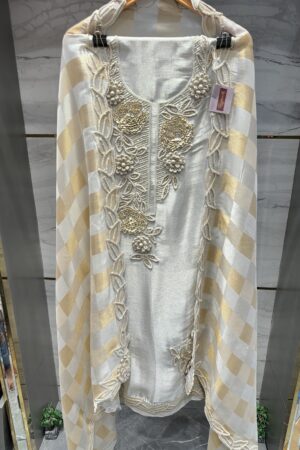 Premium pure tissue fabric with intricate dori work.