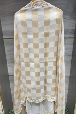 Premium pure tissue fabric with intricate dori work.