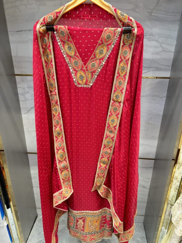 Premium Tissue silk fabric with mirror and zari embroidery.