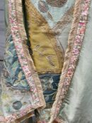 Luxurious tissue fabric with intricate gota floral embroidery.