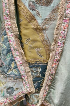 Luxurious tissue fabric with intricate gota floral embroidery.