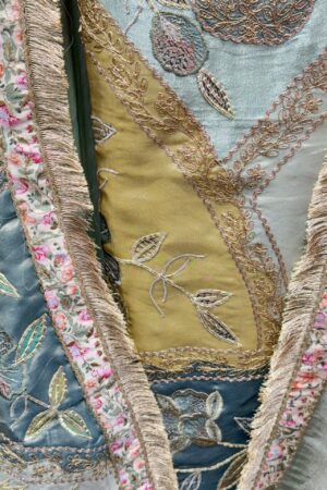 Luxurious tissue fabric with intricate gota floral embroidery.