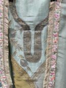 Luxurious tissue fabric with intricate gota floral embroidery.