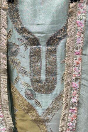 Luxurious tissue fabric with intricate gota floral embroidery.