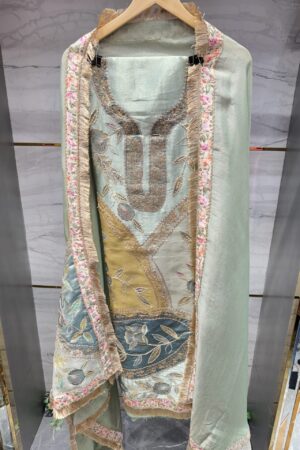 Luxurious tissue fabric with intricate gota floral embroidery.
