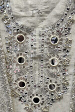 Pure Tissue Unstitched Suit with unique mirror work.