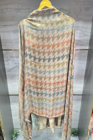 Premium unstitched suit with unique floral embroidery.